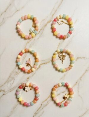 multi coloured pumpkin beads and a butterfly star charm